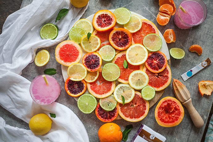 cut open lime and blood orange citrus fruits